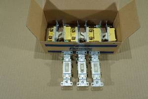 9 Ivory 15 Amp 120V Single Pole Light Switches