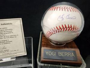 lot 36 image: Yogi Berra Autographed Baseball with COA