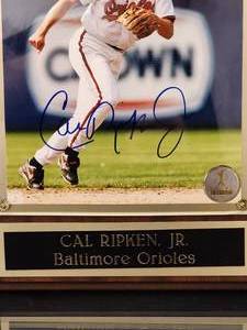 lot 40 image: Cal Ripken Jr Autographed 8 x 10 with COA