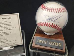 lot 41 image: Dwight Gooden Autographed Baseball with COA