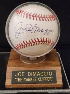 lot 77 image: Joe DiMaggio Autographed Baseball with COA