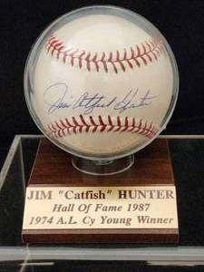 lot 76 image: Jim Catfish Hunter Autographed Baseball with COA
