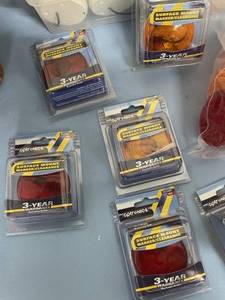 lot 57 image: Lot of Miscellaneous Trailer Light  Brake & Turn Signal Covers - Surface Mount Markers