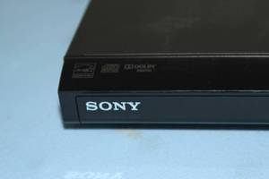 lot 76 image: Sony DVP-SR510H Ultra Slim 1080p Upscaling DVD Player with HDMI Port - Includes Remote Control