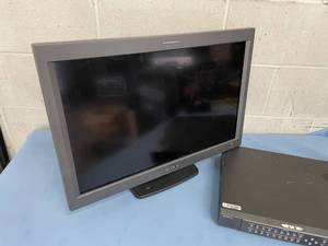 lot 143 image: Sony LMD-230W Professional 23 Widescreen LCD Monitor and MEU-WX1 Multiformat Engine Unit with Cables