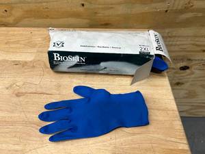 lot 78 image: BIOSKIN Blue Powder Free Latex Examination Gloves- 2XL