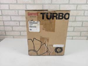lot 8 image: NOS - Garrett Turbocharger Assembly - Part No. 751361-5004S - Open Box