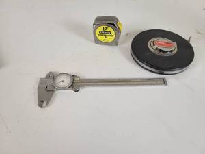 lot 560 image: Helios 6 Dial Caliper, 100 Lufkin Tape Measure and 12 Stanley Tape Measure