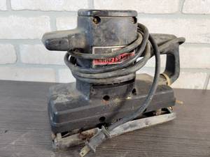 lot 596 image: Craftsman Electric Sander (Works) and Hand Saw