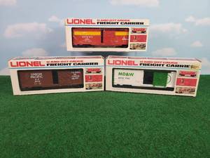 lot 285 image: (3) LIONEL OO27 Scale Freight Rail Cars  - Union Pacific Box Car, MDW Box Car & NC&StL Box Car