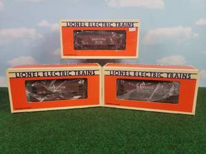 lot 291 image: (3) LIONEL O Scale SOO Line Ore Rail Cars