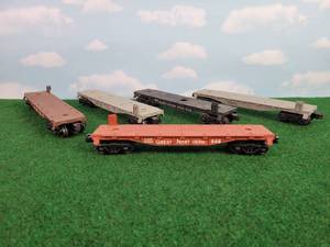 lot 316 image: (5) LIONEL O Scale Flatbed Rail Cars