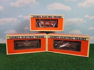lot 324 image: (3) LIONEL O Scale SOO Line & Canadian National Ore Rail Cars