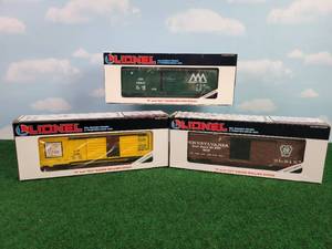 lot 366 image: (3) LIONEL OO27 Scale Rail Cars - Union Pacific Double Door Boxcar, Vermont Railway Boxcar, & Pennsylvania Boxcar