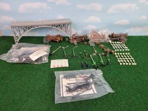 lot 337 image: (80) HO-Scale Power Poles, Unopened Claybourn Station Kit, Unopened Signal Bridge, Trestle Bridge, Assorted Powered Lights, Street Signs and More