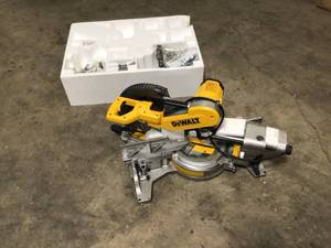 lot 5 image: DEWALT 15 Amp Corded 12 in. Double Bevel Sliding Compound Miter Saw, Blade Wrench and Material Clamp Open Box See Pics