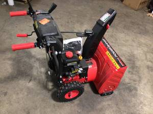 lot 8 image: Power Smart 24 in. 2-Stage Electric Start Gas Snow Blower with Heated Handles and LED Light In working Conditions