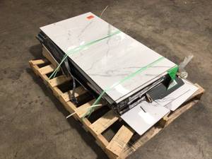 lot 9 image: MSI Ader White 24 in. x 48 in. Polished Porcelain Marble Look Floor and Wall Tile 13 Pcs See Pics