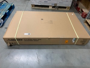 lot 52 image: New in Box Husky 52 in. Adjustable Height Work Table in White