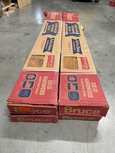 lot 69 image: 4 boxes Bruce Hardwood Flooring Solid Oak - Light Spice  Approx 92 sq ft