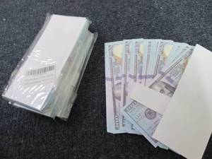 5 pks Prop Money...