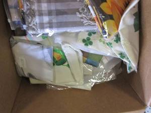 box of new decorative pillow covers...