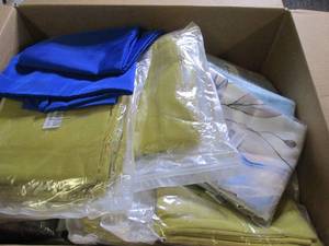 box of new decorative pillow covers...