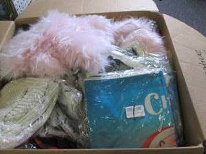 box of new decorative pillow covers...