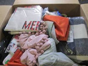 box of new decorative pillow covers...