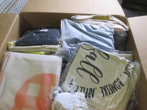 box of new decorative pillow covers...