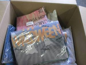 box of new decorative pillow covers...