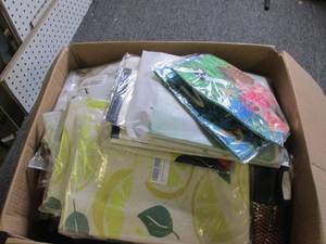 box of new decorative pillow covers...