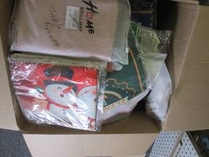 box of new decorative pillow covers...