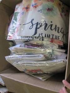 box of new decorative pillow covers...