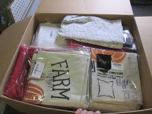box of new decorative pillow covers...