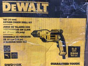 lot 63 image: DEWALT 8 Amp Corded 38 in. Pistol Grip Drill open box review pictures