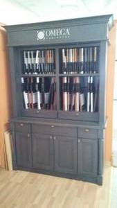 lot 2 image: Omega Display Cabinet with Contents.