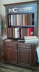 lot 11 image: Mid Continent Display Cabinet with Contents