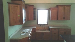 lot 12 image: Mid Continent Display Kitchen with Flooring.