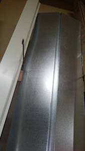 lot 528 image: Misc. White And Galvanized Corners, Roof Etc.