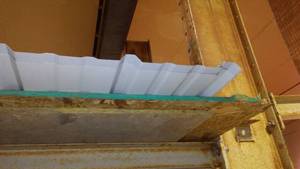 lot 536 image: (2) MDF Chip Board And White Metal Siding