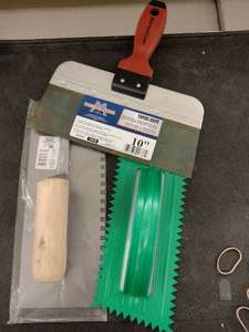lot 220 image: Notched Trowels and Taping Blade.