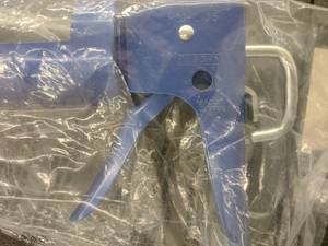 lot 113 image: Newborn Qt. Caulk Gun.