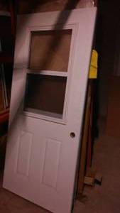 lot 652 image: Exterior Door With Window And Screen