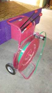 lot 737 image: Load Binding Reel And Strap. More pictures with LOTS more