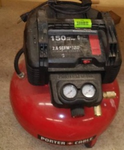lot 752 image: Porter Cable Pancake Air Compressor.