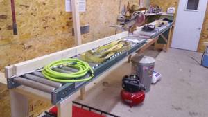 lot 755 image: Rockwell RK 7138 Sliding Miter Table Saw With Rollers And Stand.