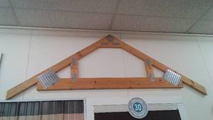 lot 812 image: (4) roof trusses as displays.