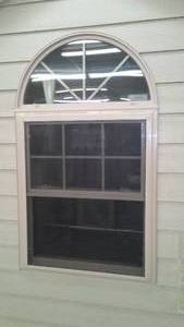 lot 817 image: Installed arch window - display 35W x 59 to peak.