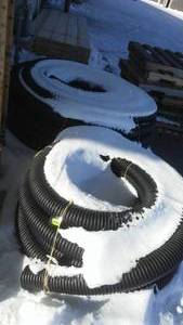 lot 784 image: 2 Rolls Corrugated Black Hose.